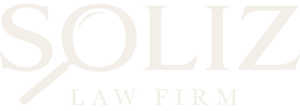 Soliz Law Firm logo featuring a magnifying glass symbol representing attention to detail and the firm’s focus on personal injury law.