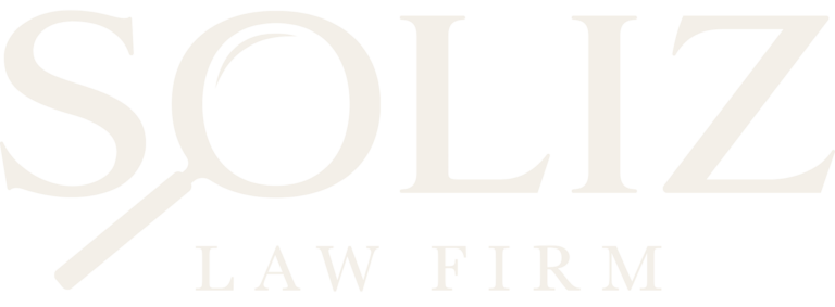 Soliz Law Firm logo featuring a magnifying glass symbol representing attention to detail and the firm’s focus on personal injury law.