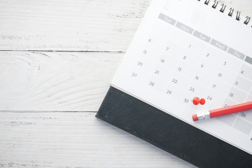 deadline concept with push pin on calendar date